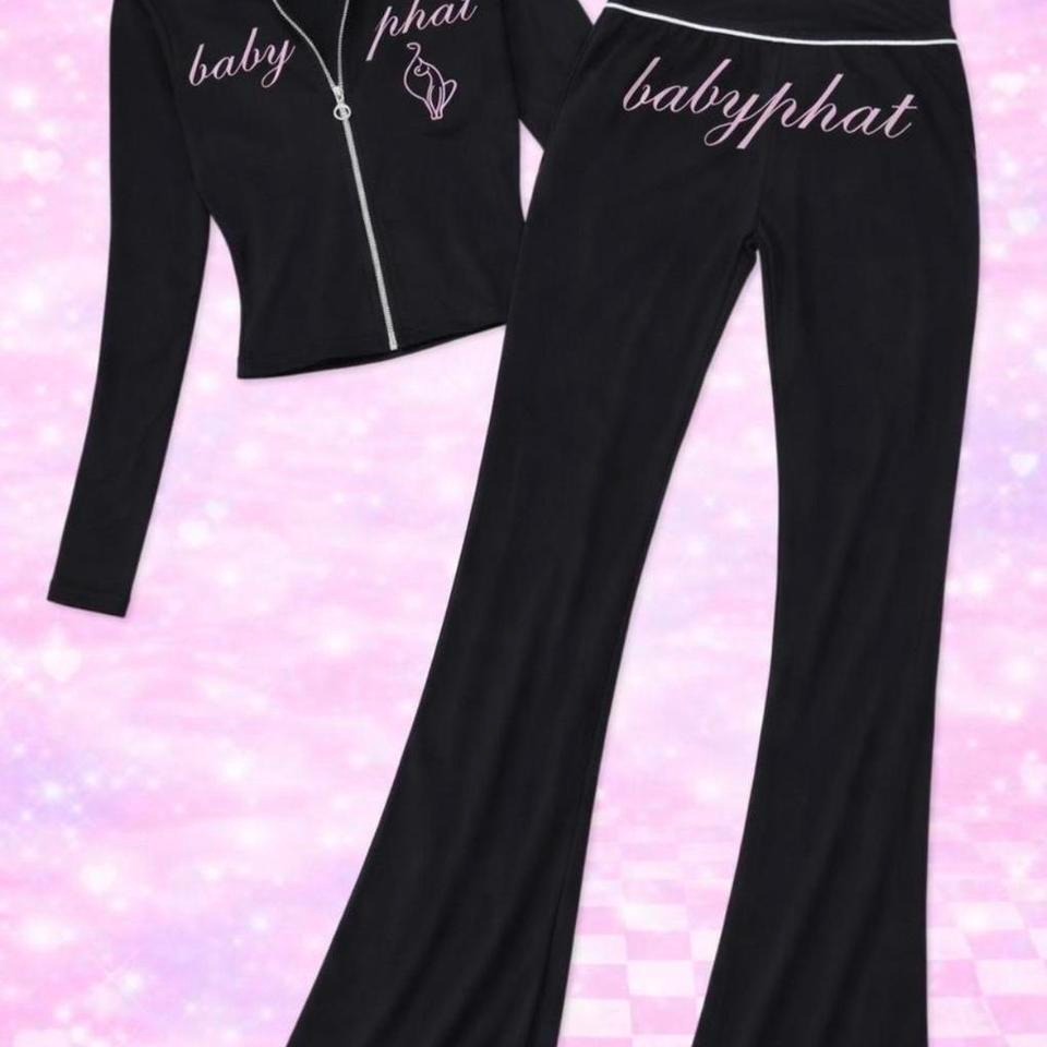 Black Baby Phat zip-up jacket and matching trousers laid out together with the cat logo printed in pale grey